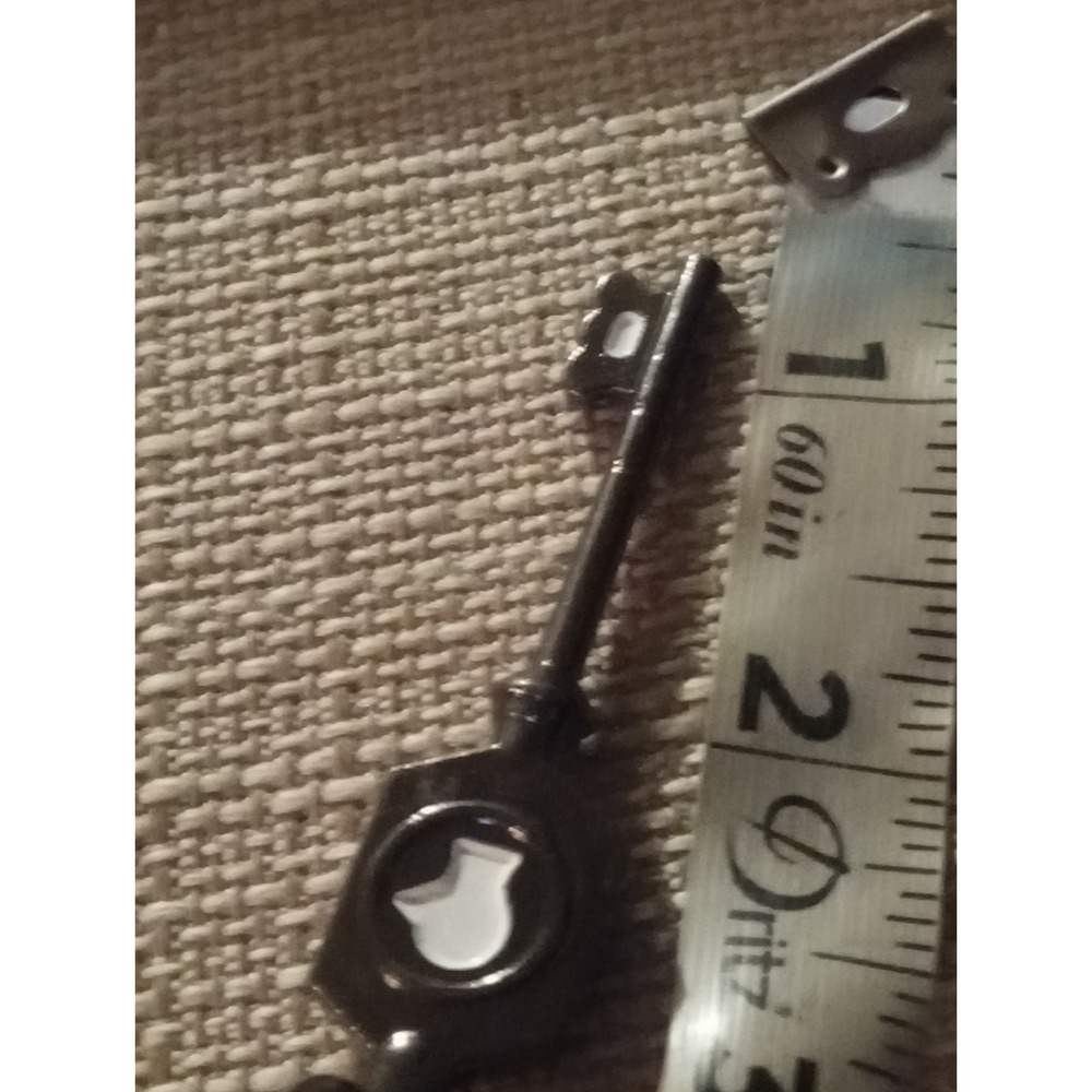 Unique Black Key Charm Keychain With Silhouette Design